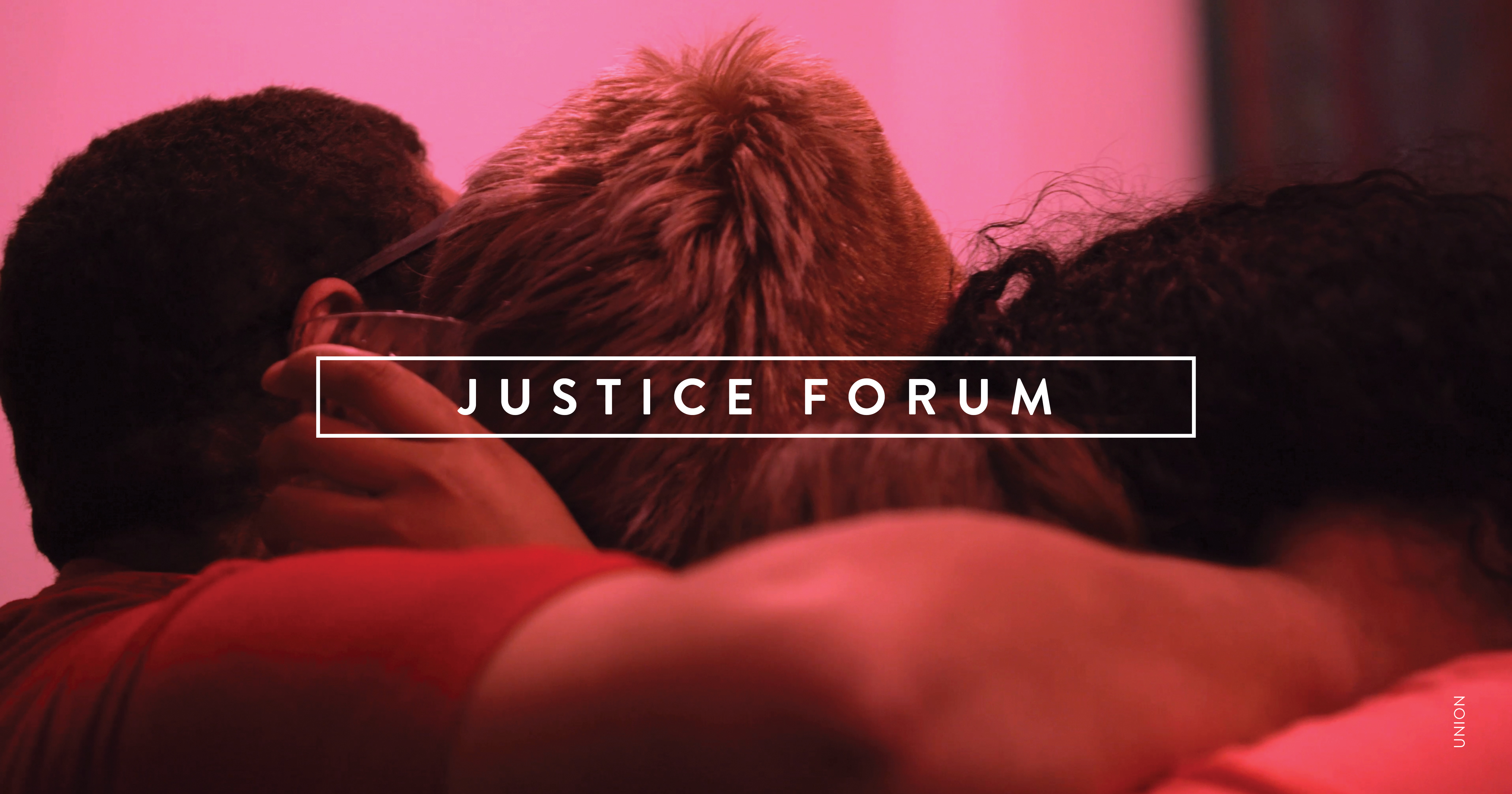 A pink-tinted image of three people in a huddle, with only their heads visible. White text overlays the image that reads: JUSTICE FORUM